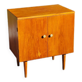 Vintage golden oak sideboard with conical legs from the 1950s