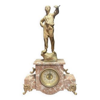 Pink marble clock topped with a character