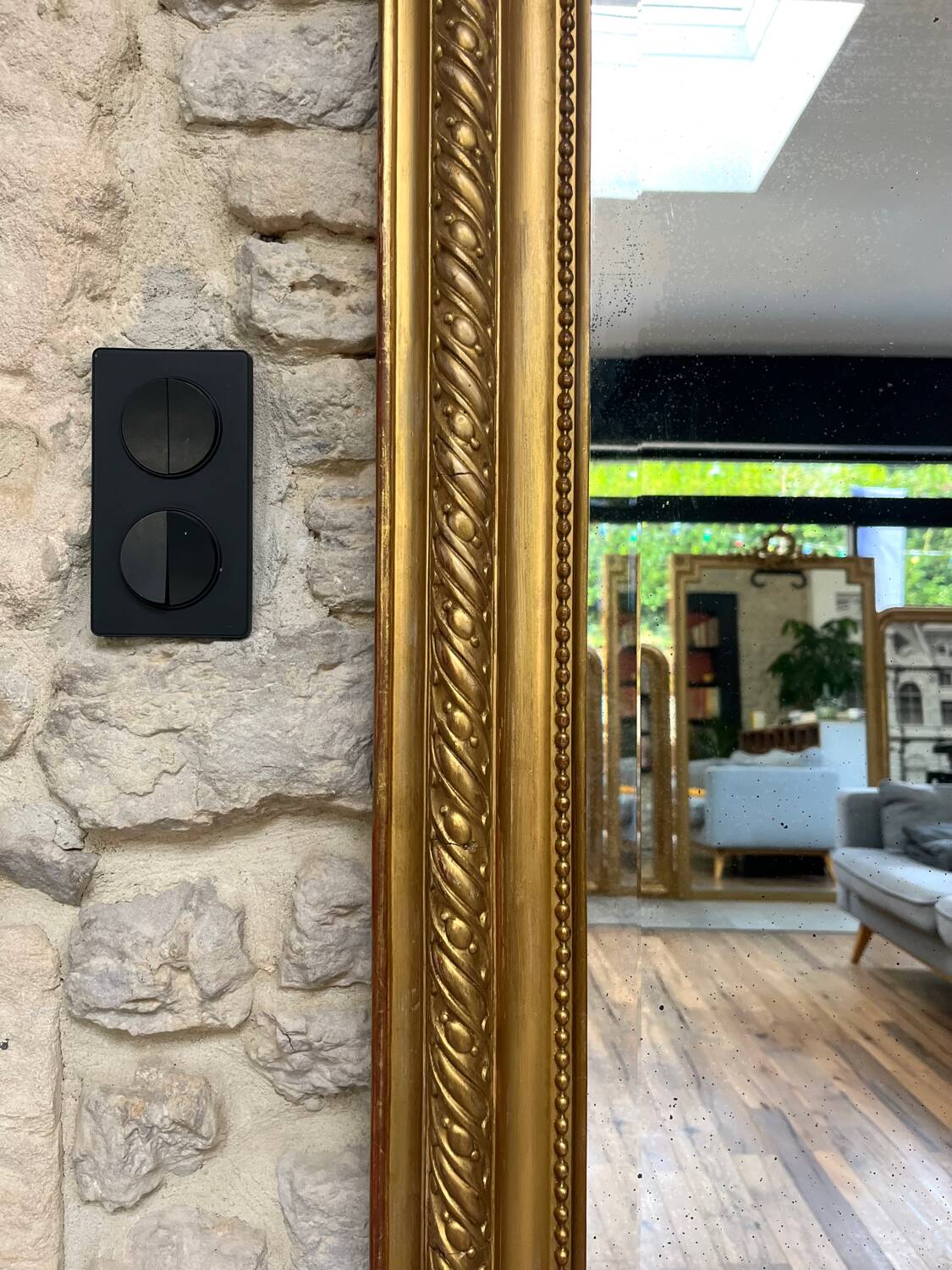 Pedimented mirror 184.5cm/135cm gilded with gold leaf