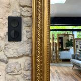 Pedimented mirror 184.5cm/135cm gilded with gold leaf