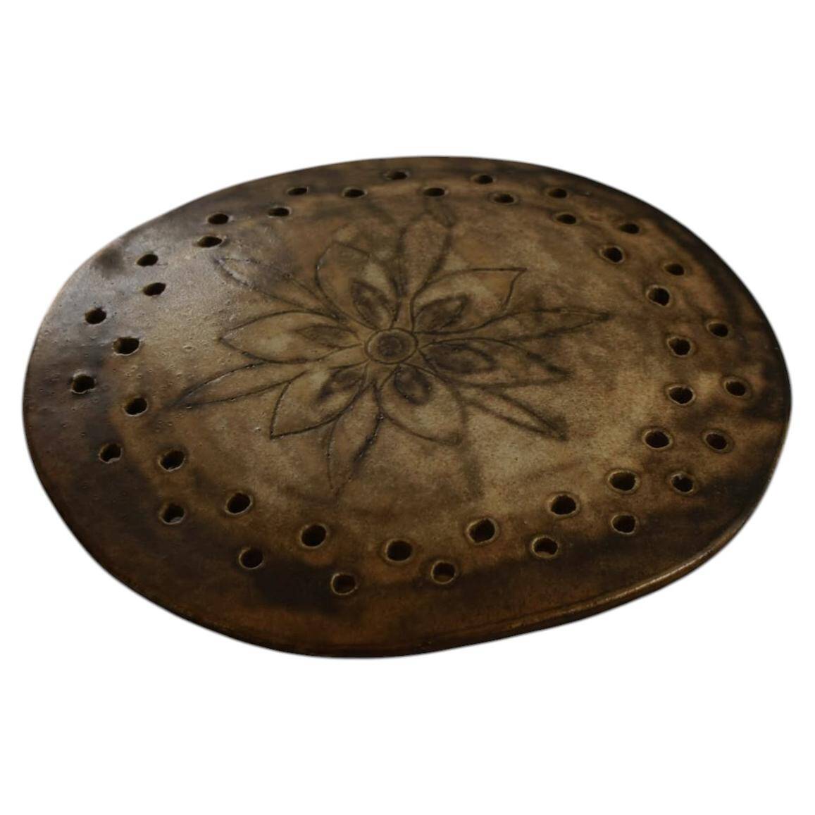 Mid-century sculptural wall light in organic Danish ceramic, 1970.