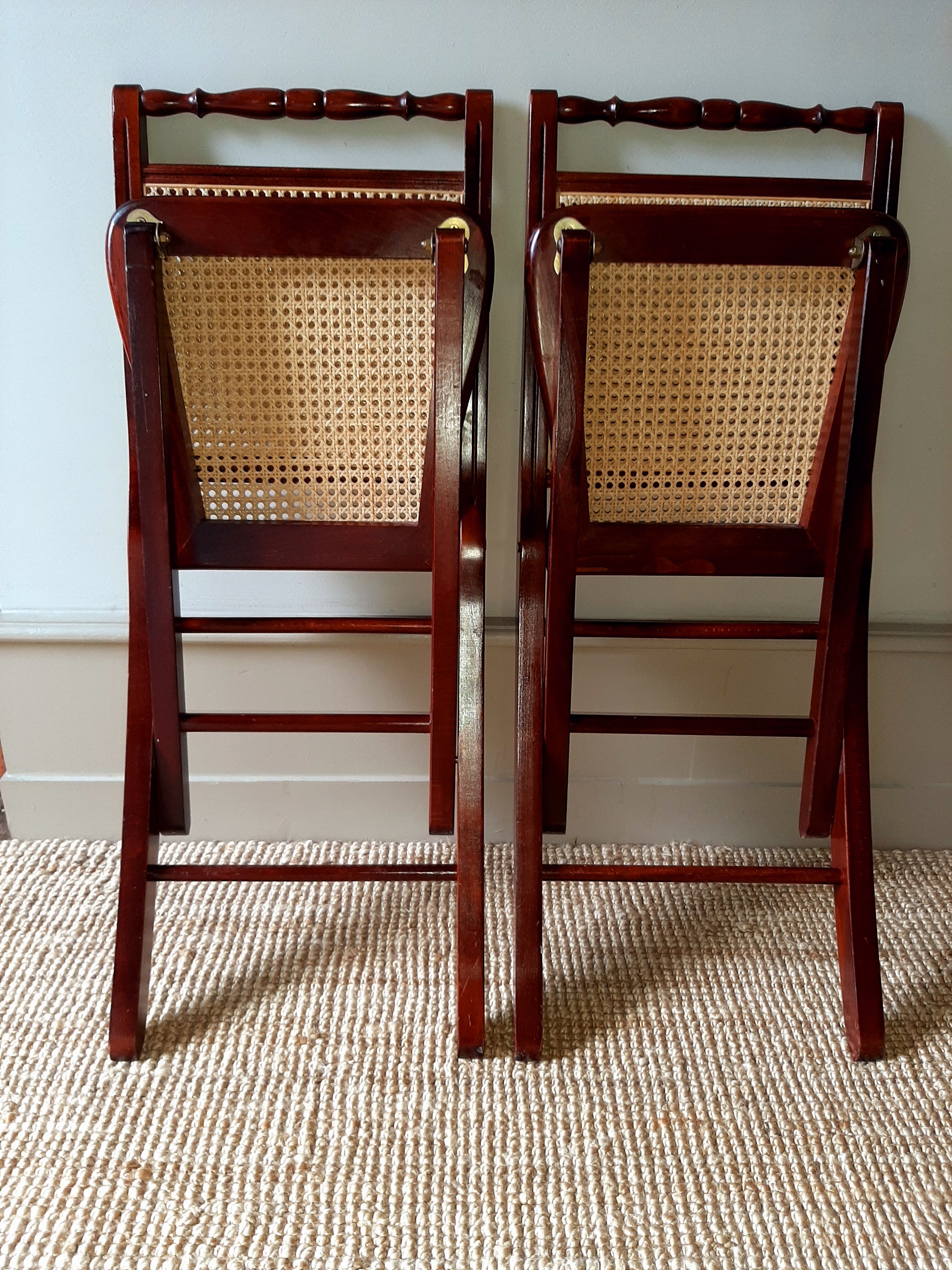 Folding wooden chairs and cannage