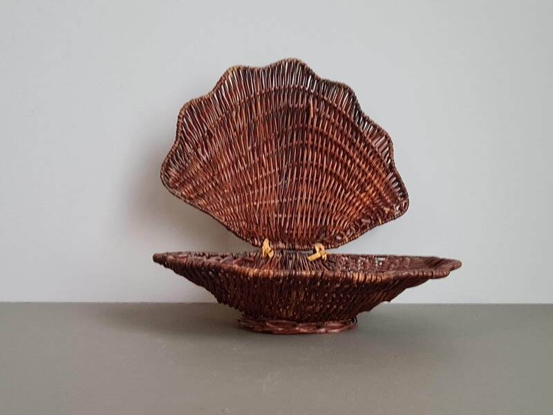 Vintage wicker shell basket, French bohemian decoration.