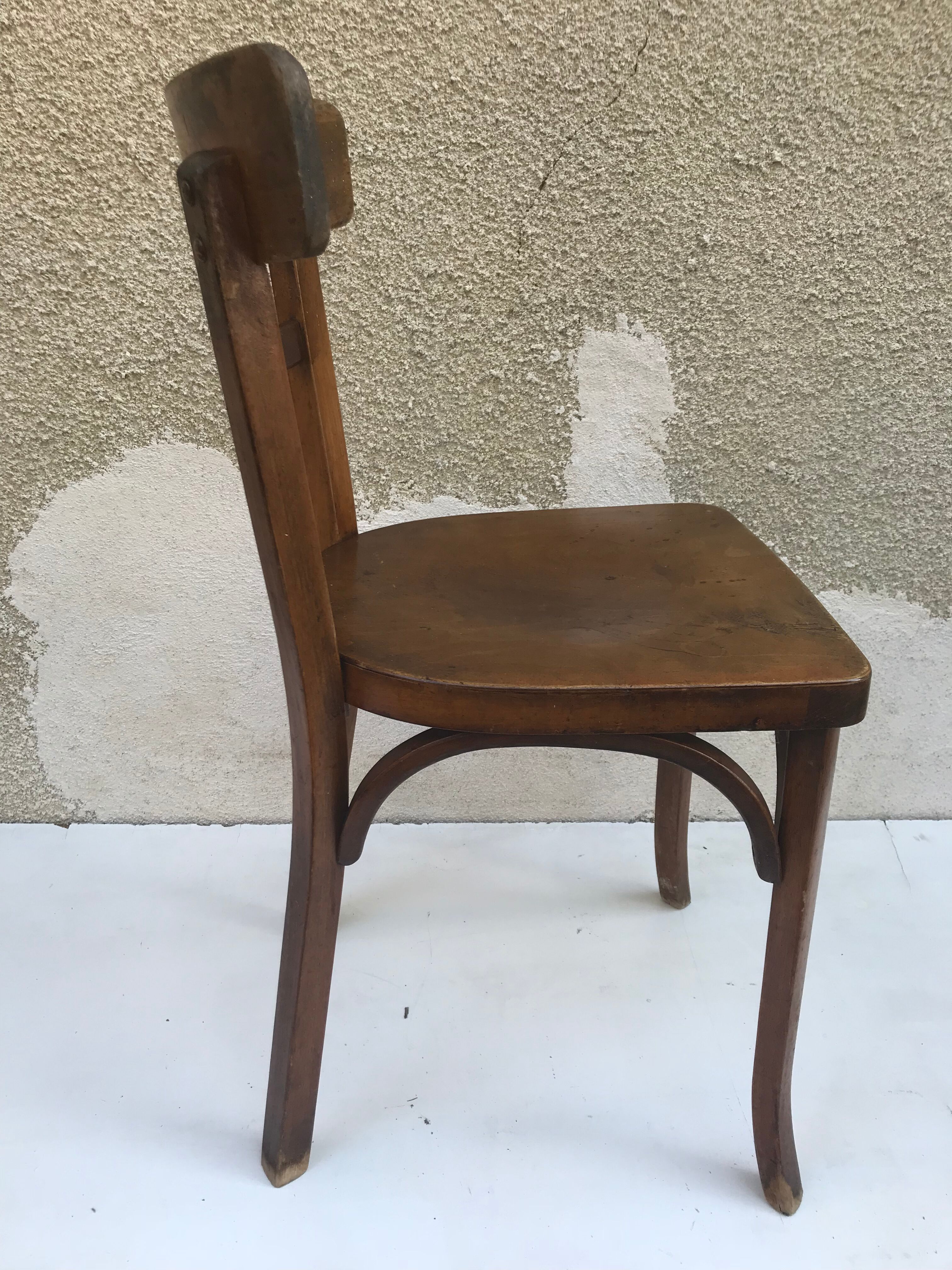 Serie de 4 chaises anciennes bistrot Baumann années 60