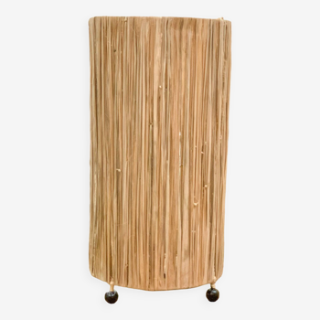 Cylindrical lamp in natural raffia