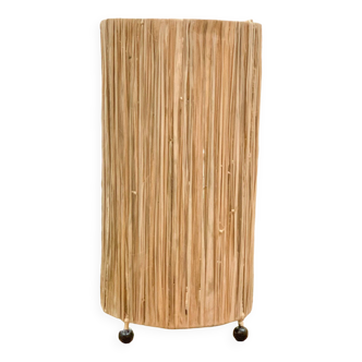 Cylindrical lamp in natural raffia
