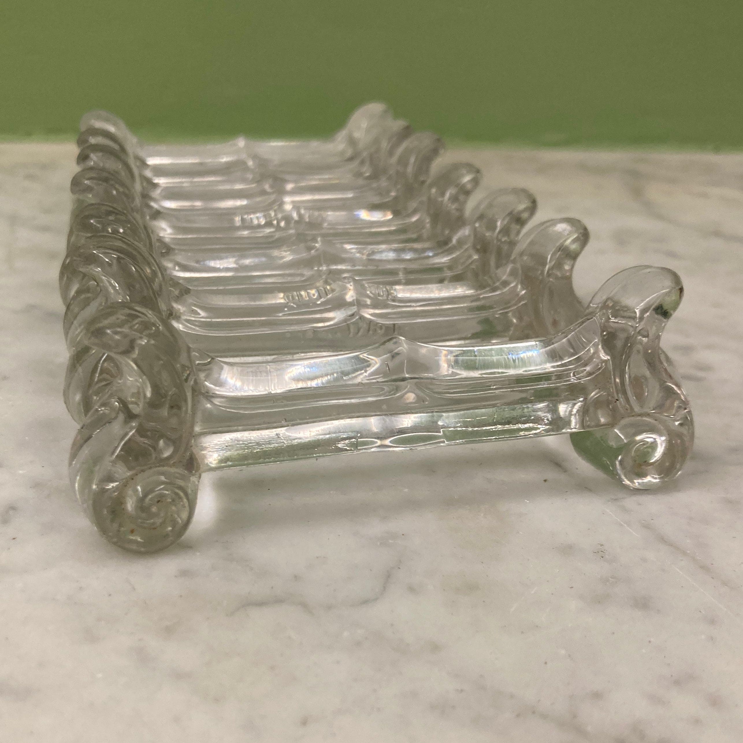 Portieux set of 7 moulded crystal knife rests from the early 20th century.