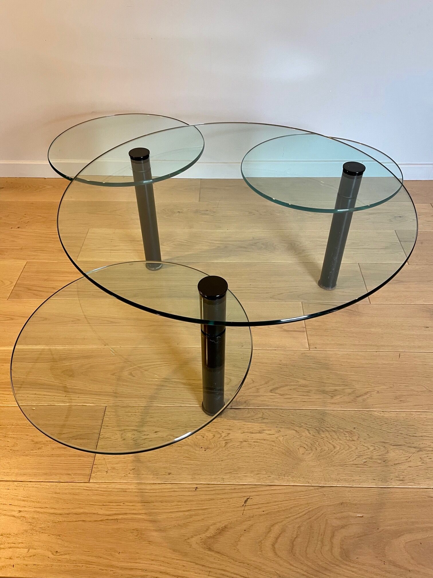 Glass coffee table and black base