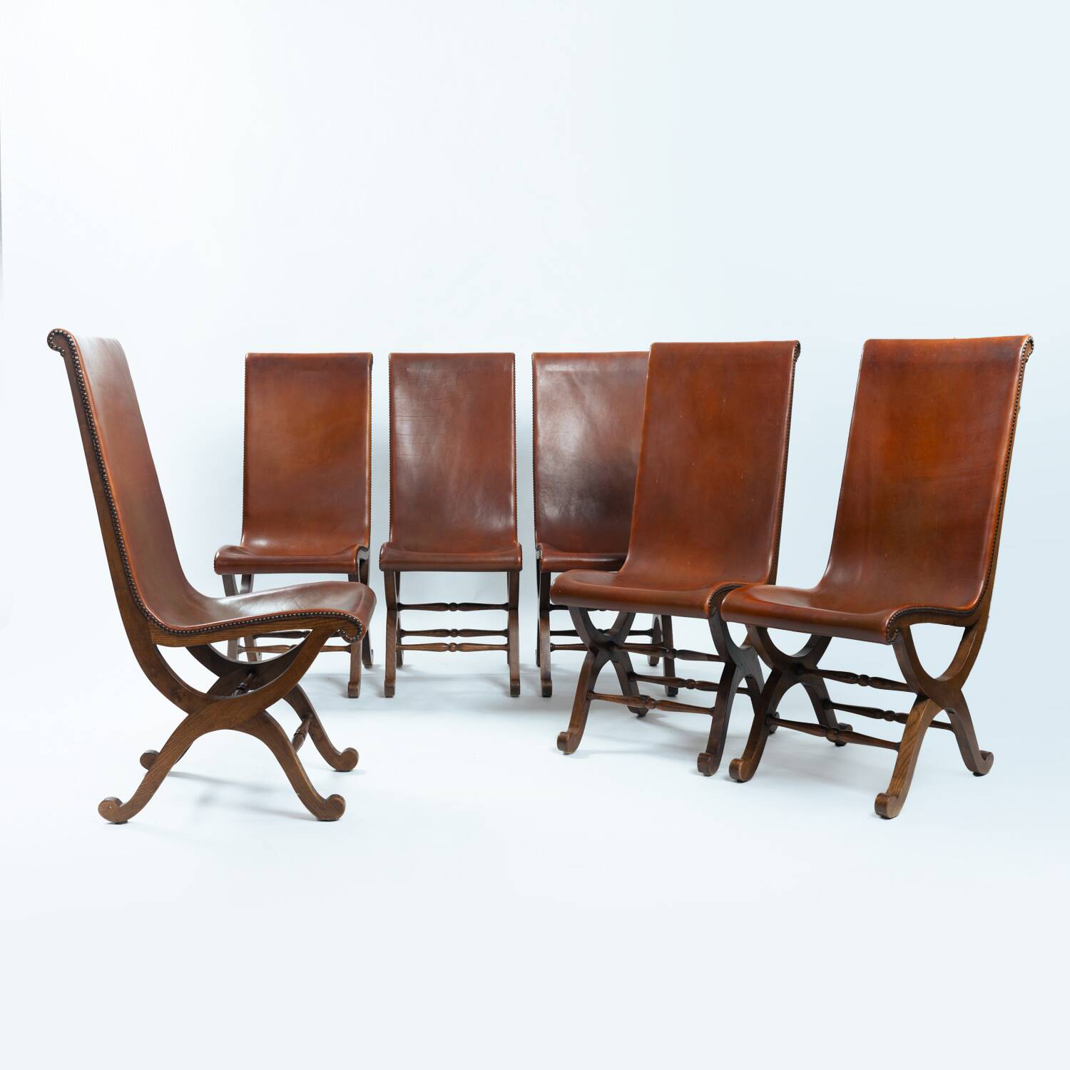 Pierre Lottier brown Spanish leather Slipper chairs by Almazan, 1950s