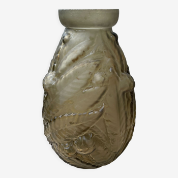 Vase with plant motifs in relief