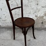 Série de 7 anciennes chaises bistrot Baumann bois courbé assise ronde