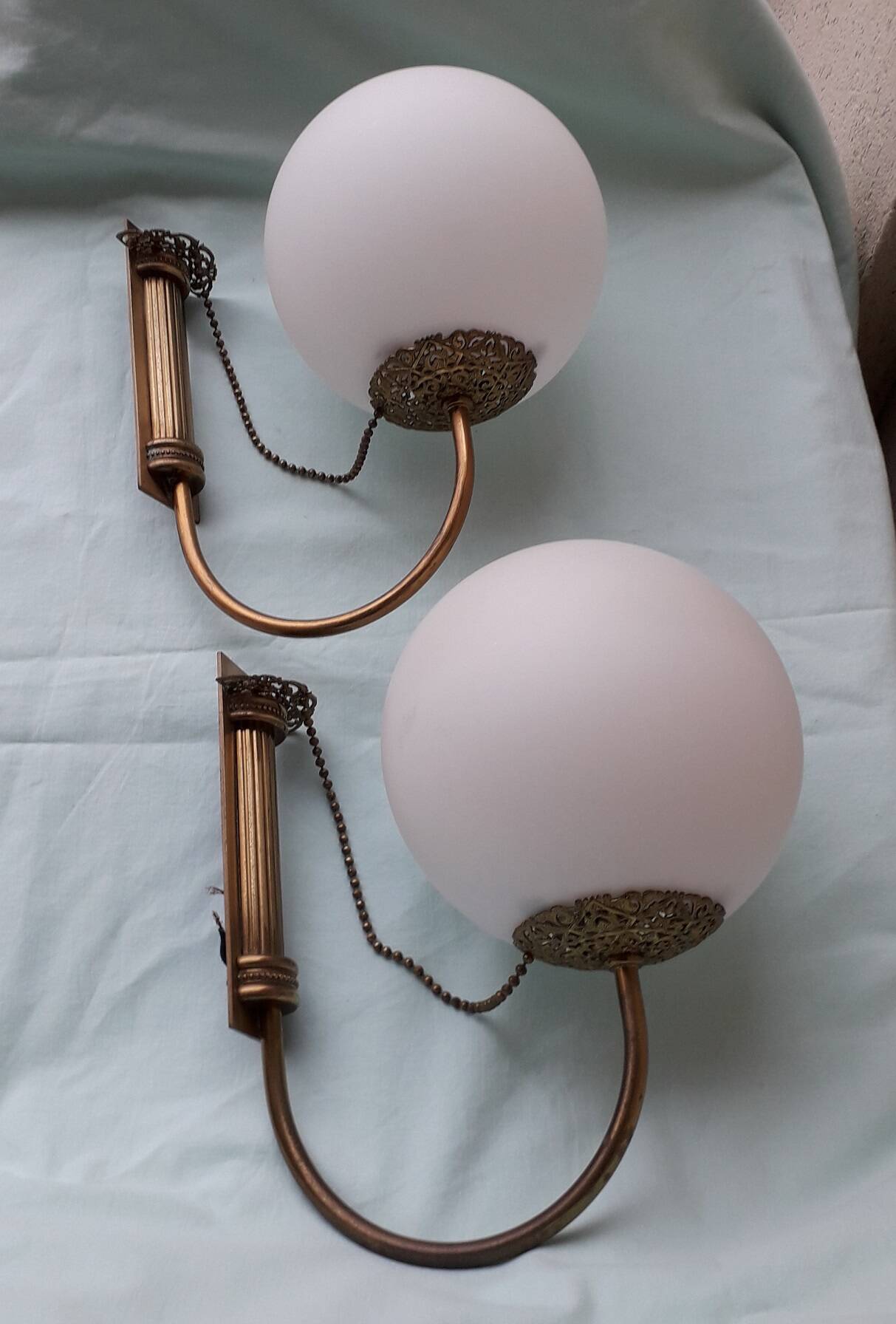 Pair of metal and opaline wall lights