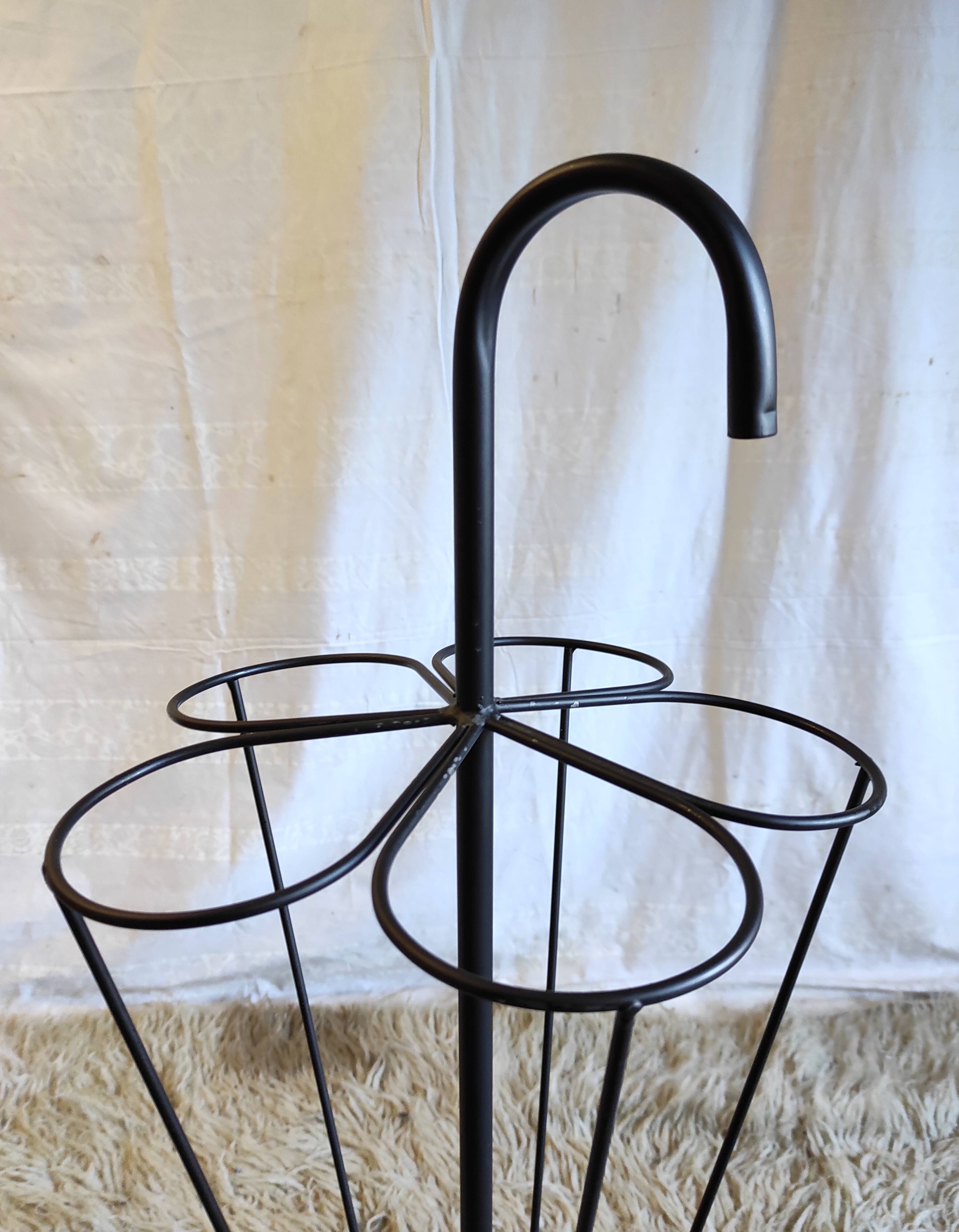 Black metal umbrella holder