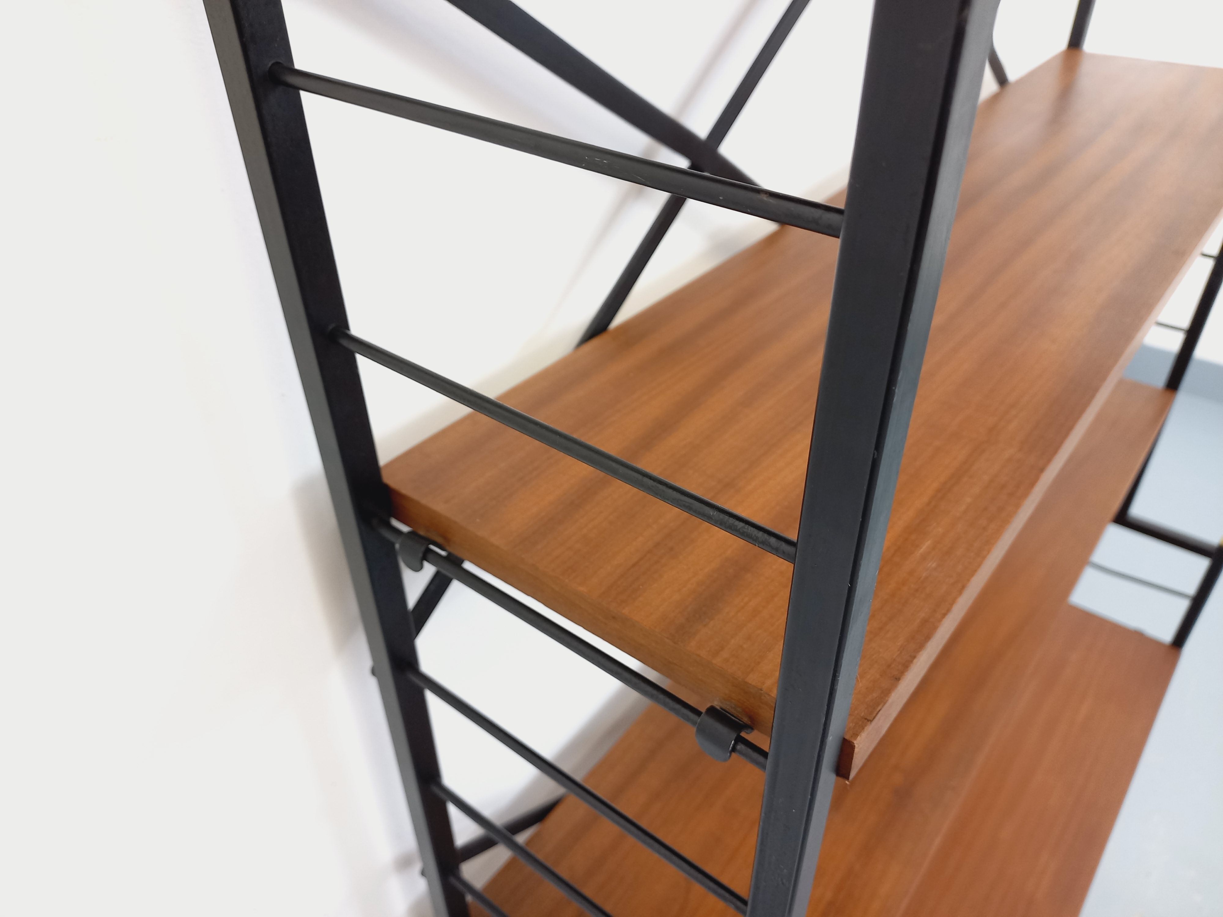 Vintage Italian bookshelf in teak and metal from the 1960s.