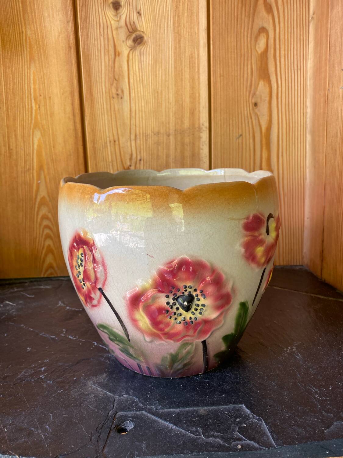 Earthenware cache pot with slip decoration.