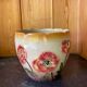 Earthenware cache pot with slip decoration.