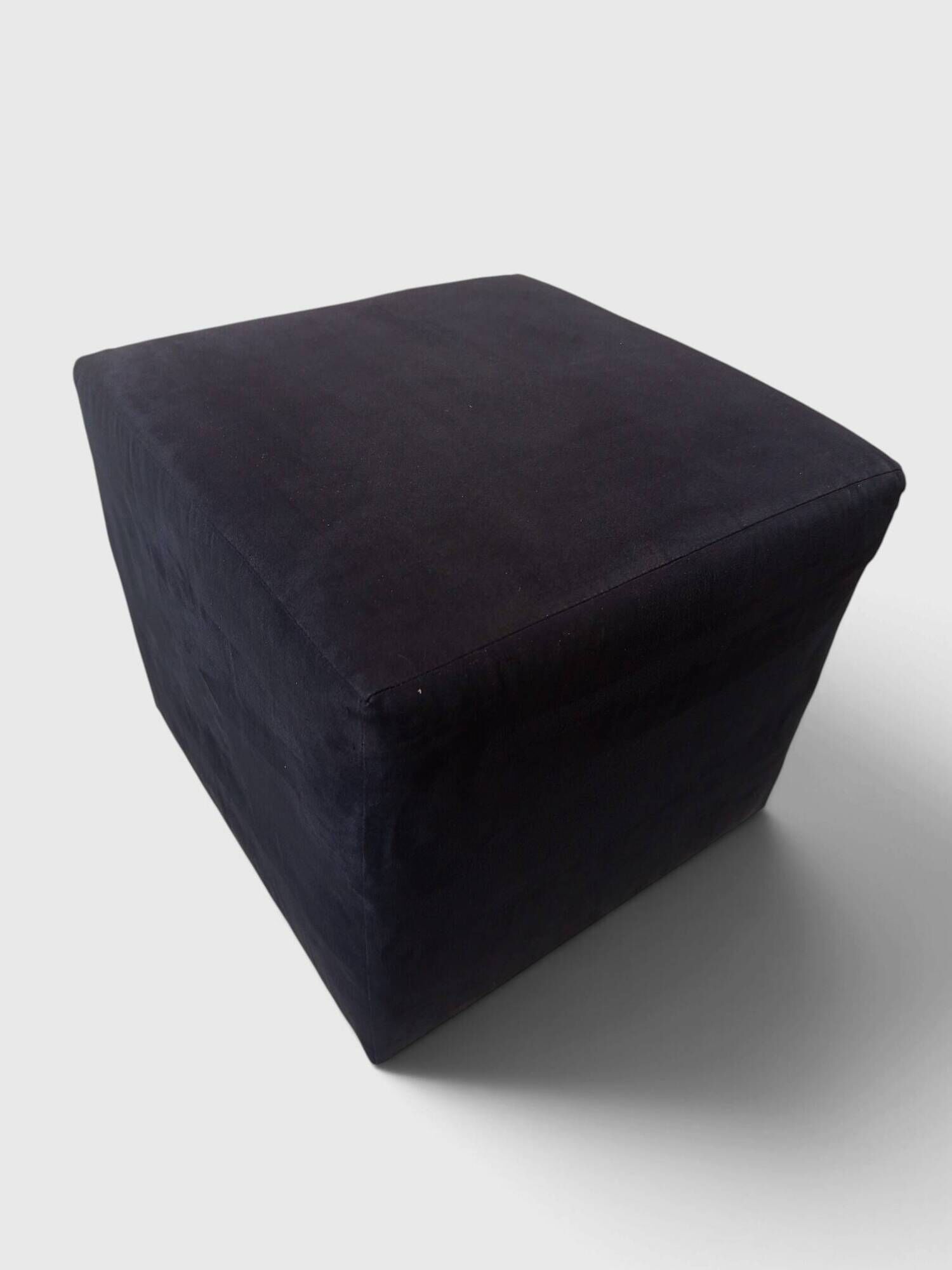 Minimalist square pouffe in black suede