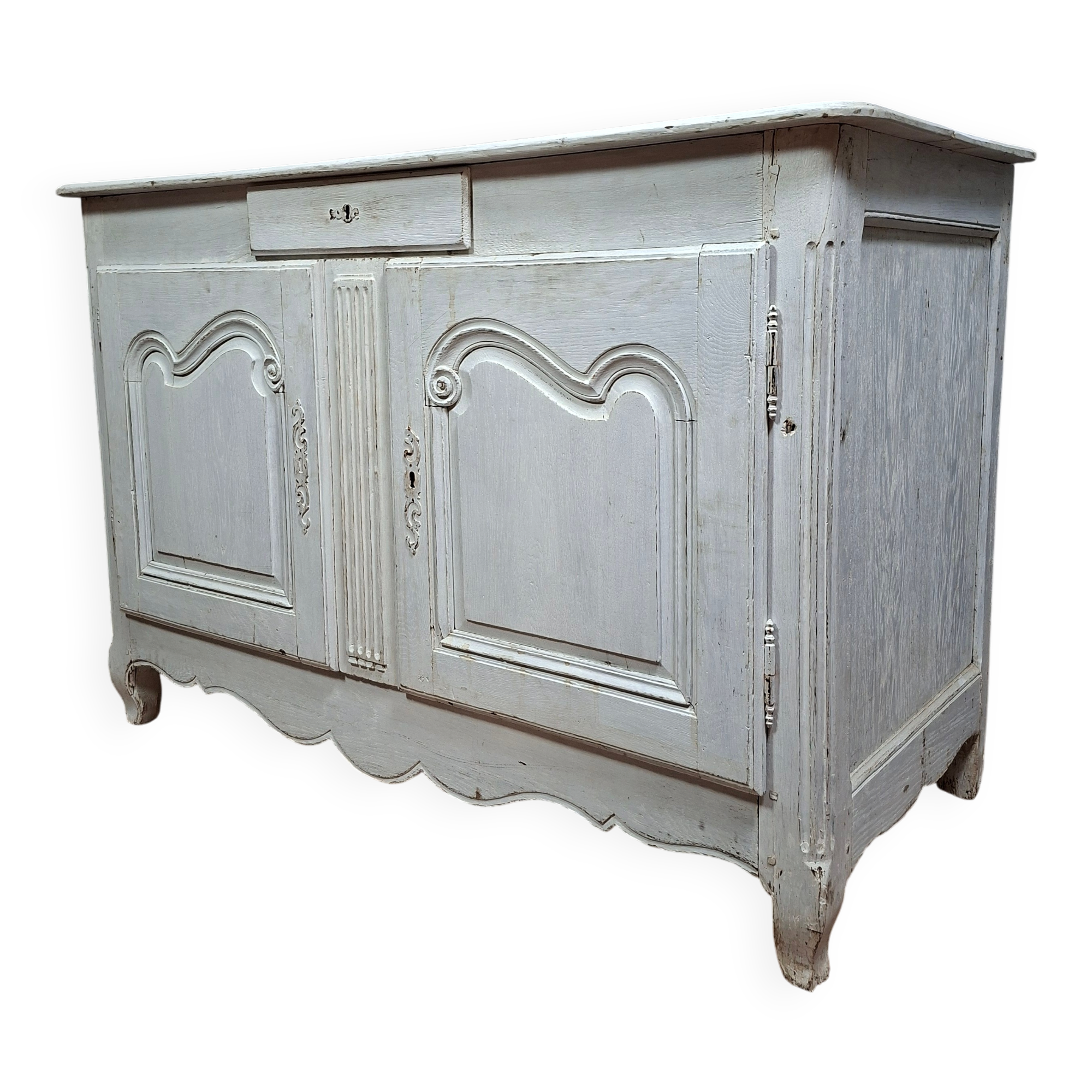 rustic buffet from the Louis XV period in natural wood with a distressed finish