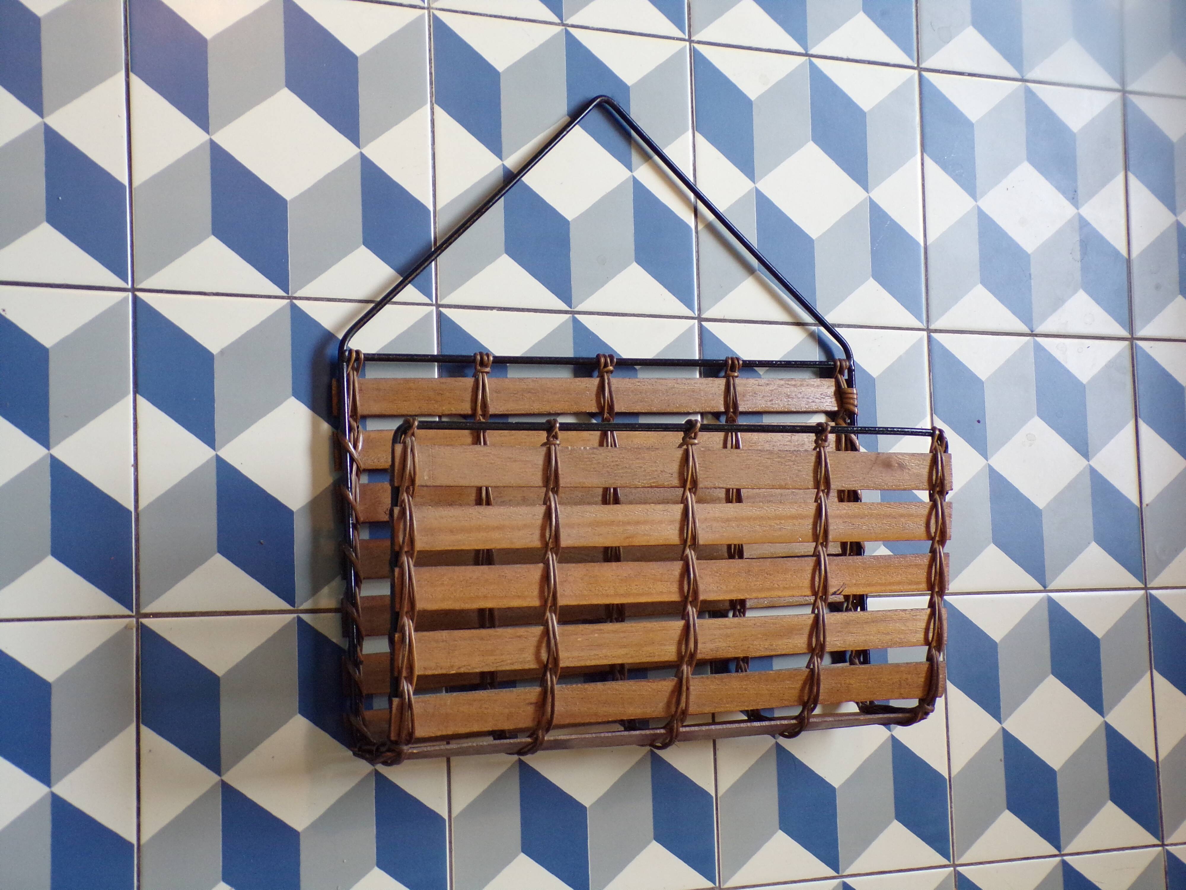 Vintage wall-mounted magazine rack