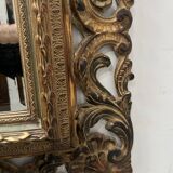 Napoleon III style mirror in carved wood, 20th century.