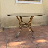 Round table.1970. Rattan and smoked glass. 120cm.
