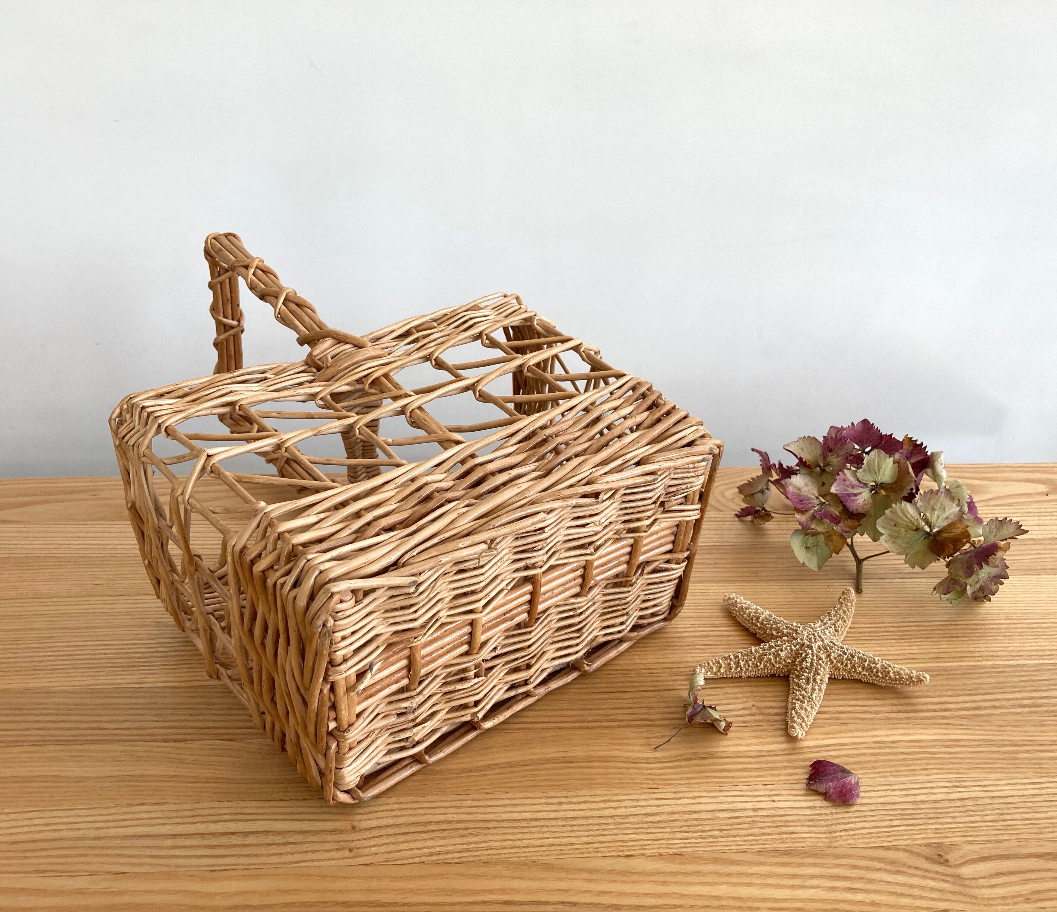 Vintage wicker bottle-bearer basket