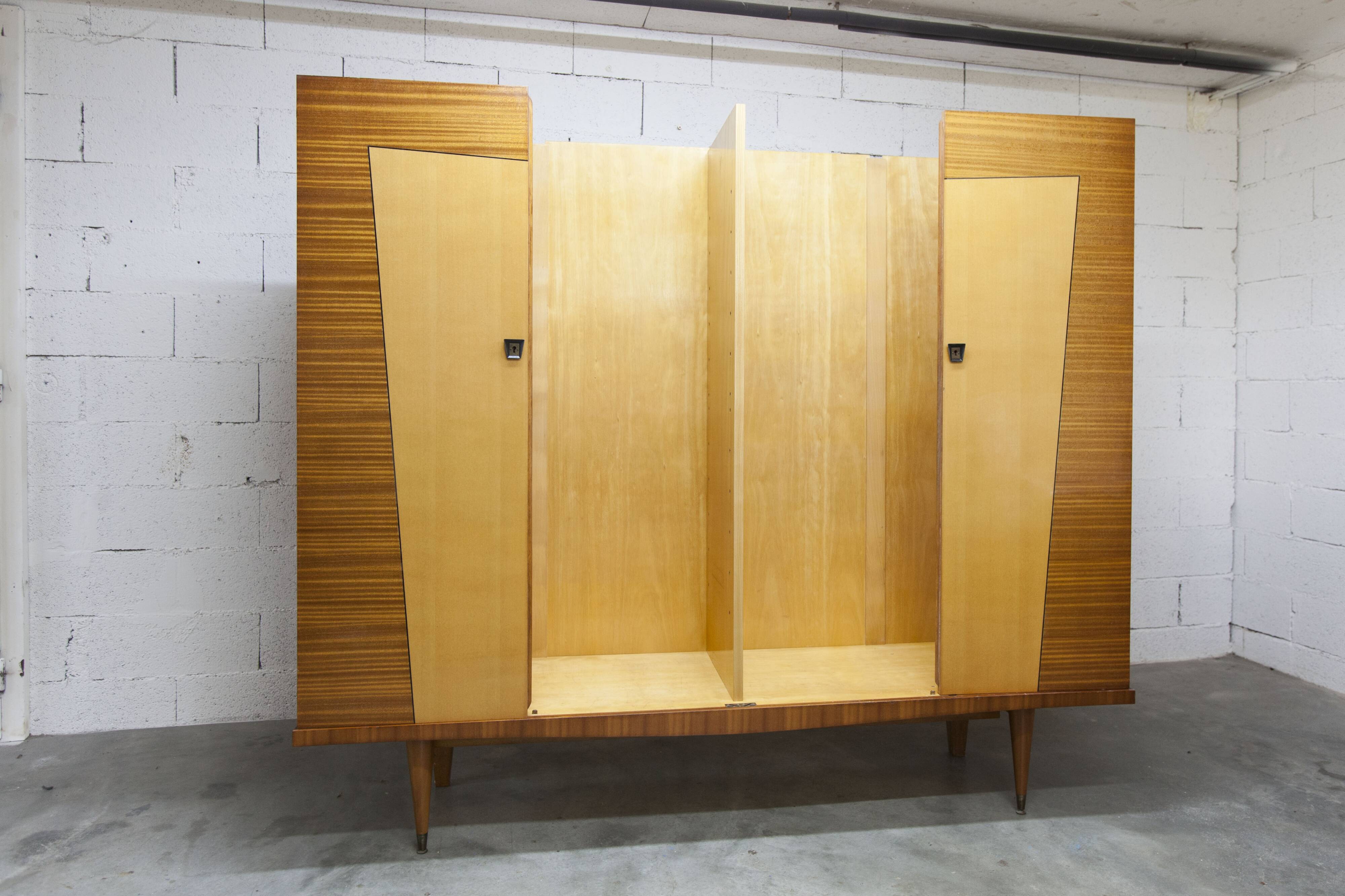 1960s Scandinavian wardrobe, blonde varnished wood, unusual, 4 doors, 3 drawers, 7 shelves.