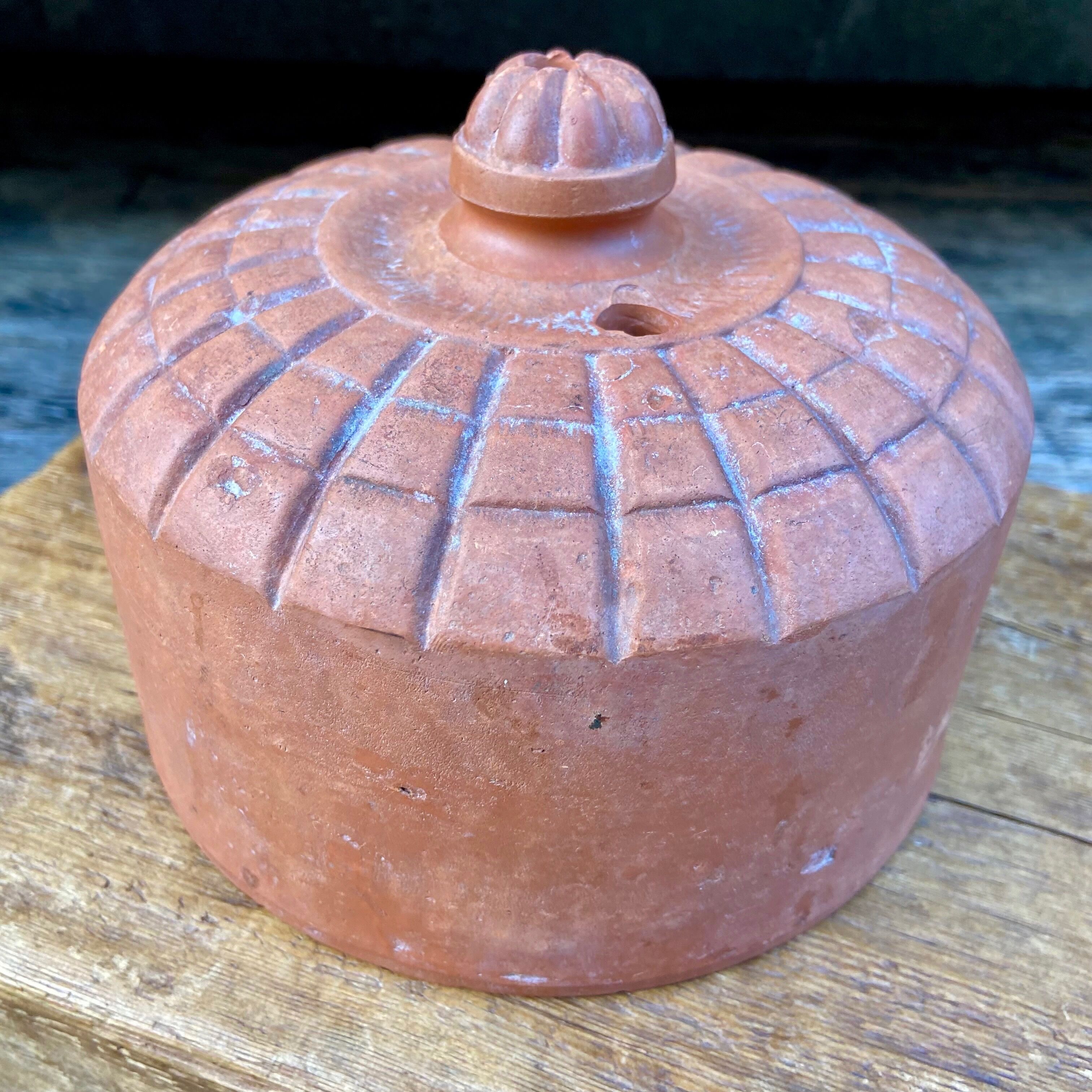 Terracotta cheese bell