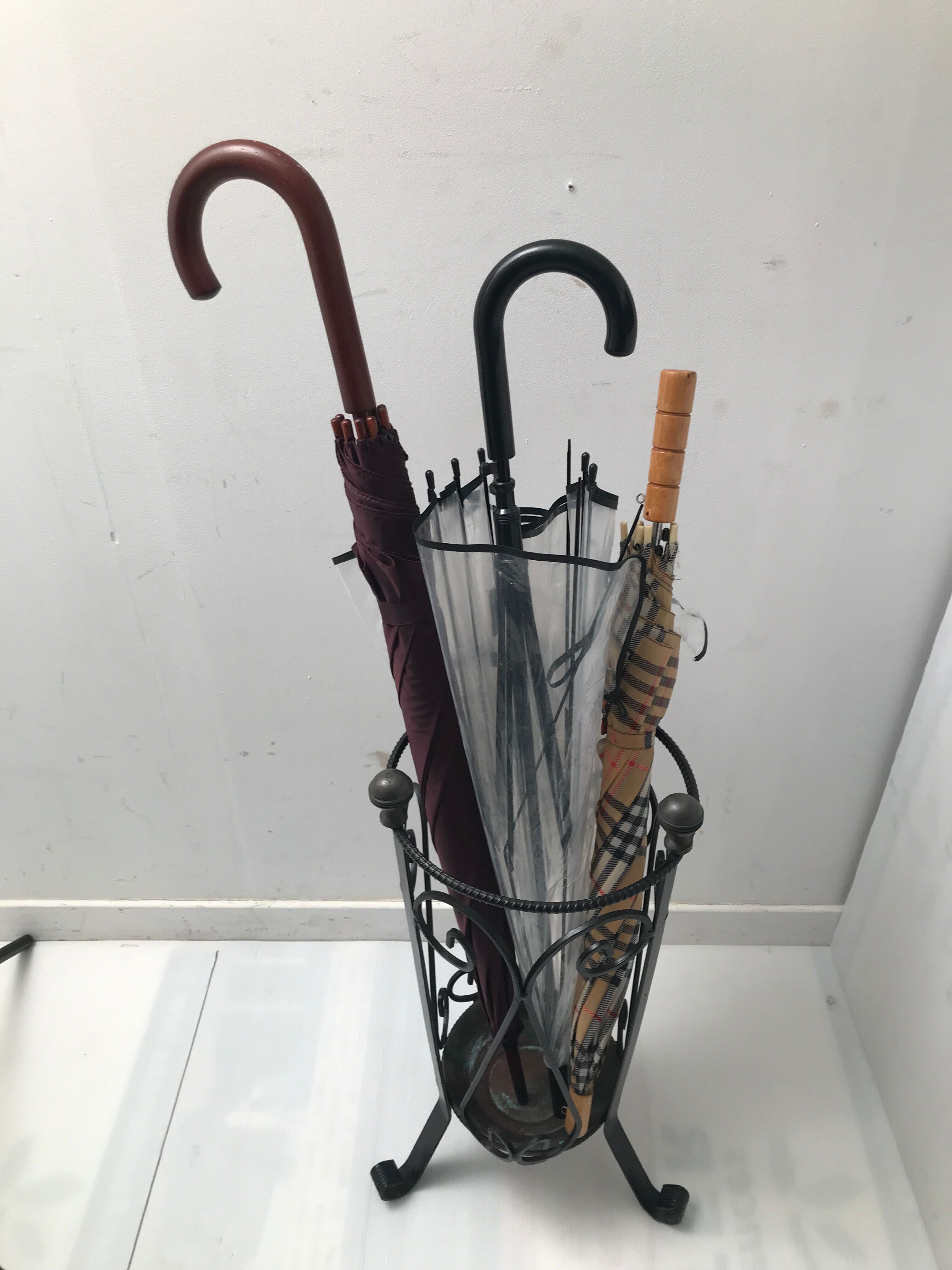 Wrought iron umbrella holder