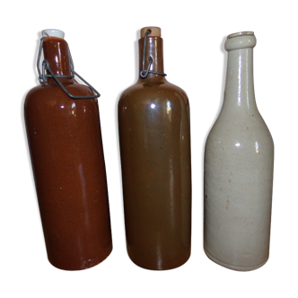 Lot of 3 bottles of varnished sandstone