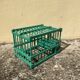 Vintage bird cage in green wood retro paint