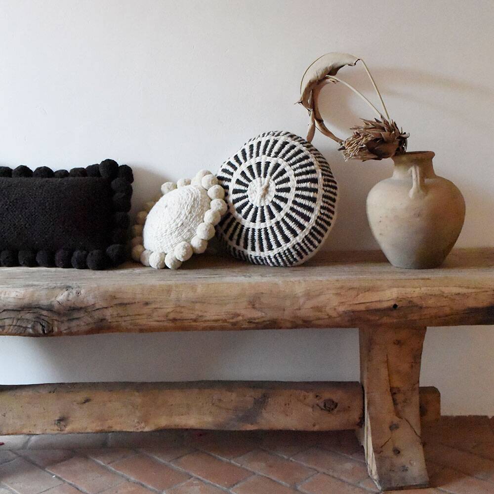 Coussin rond en laine à motifs blanc