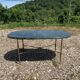 Table basse ovale en marbre vert veiné