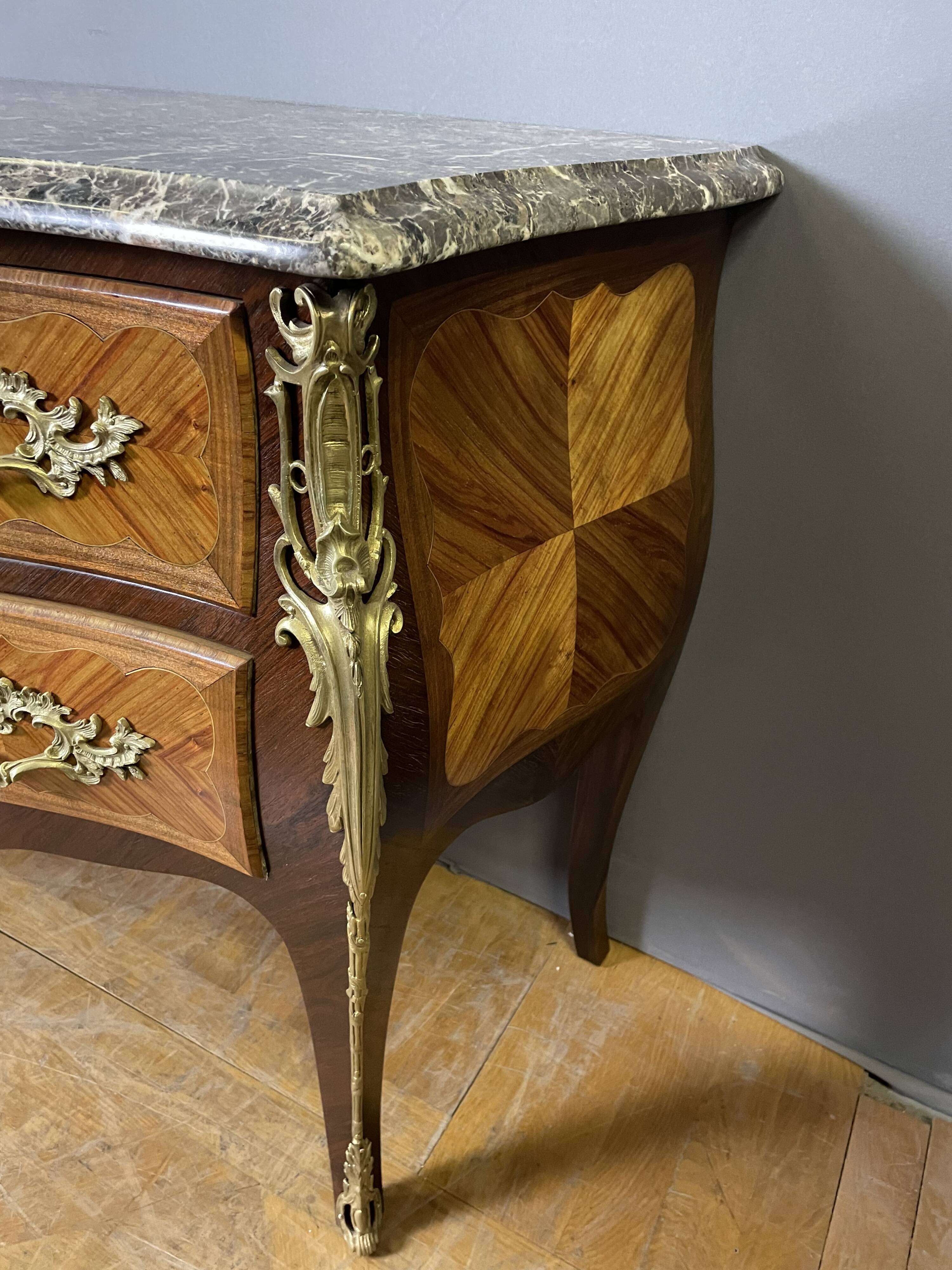 Louis XV style commode in marquetry from around 1920.