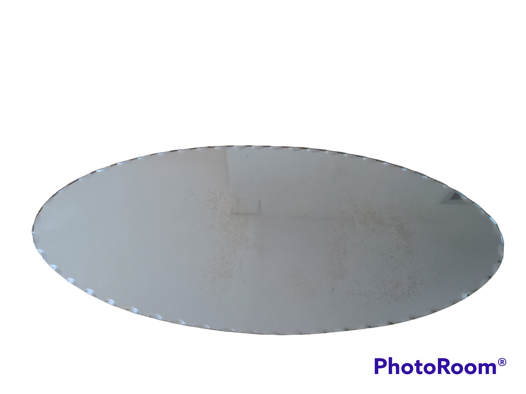 Vintage chiseled bevelled mirror under oval velvet