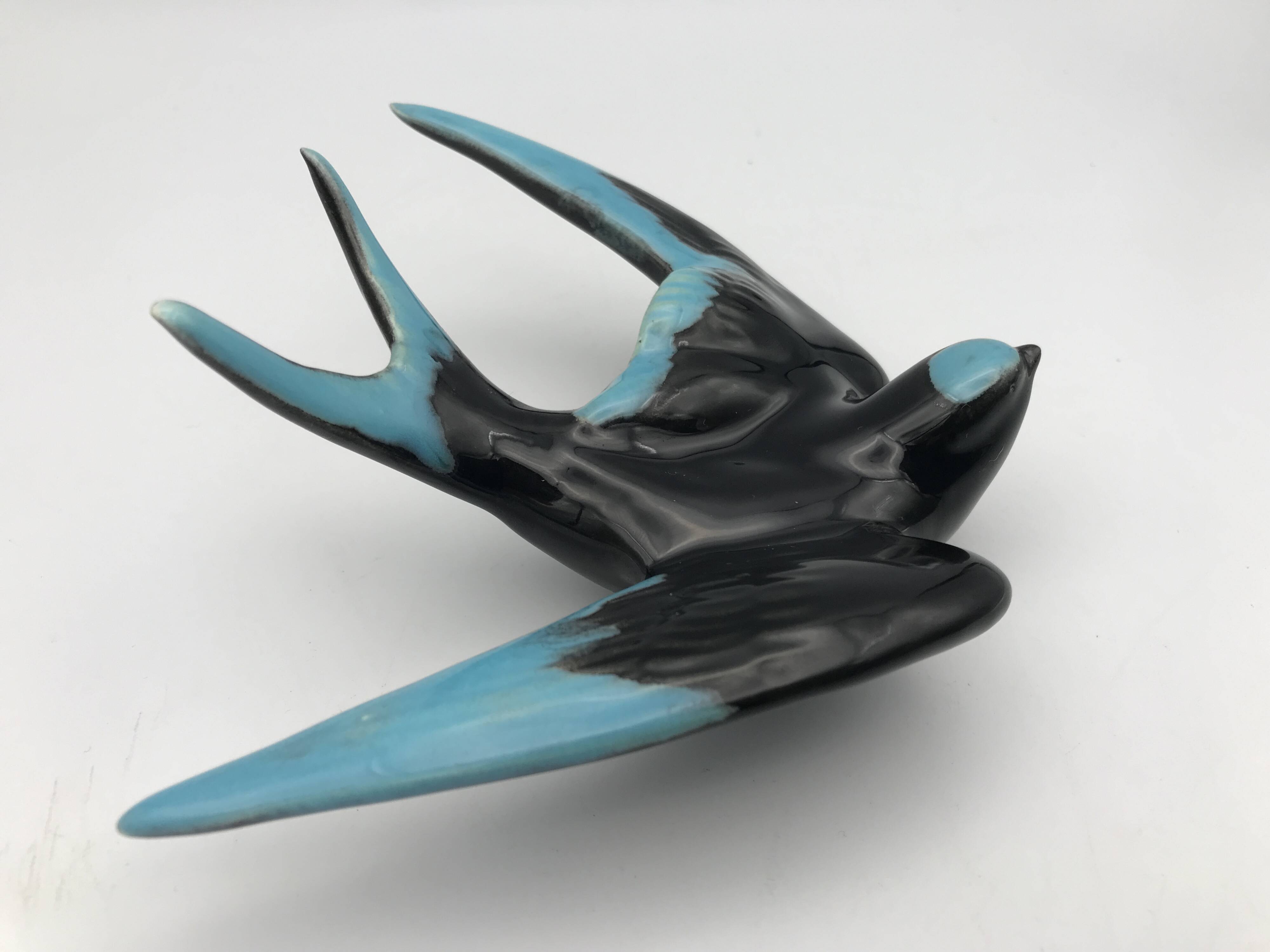 Vintage swallow in two-tone black and blue enameled ceramic
