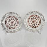 Pair of openwork porcelain plates decorated with roses