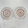 Pair of openwork porcelain plates decorated with roses