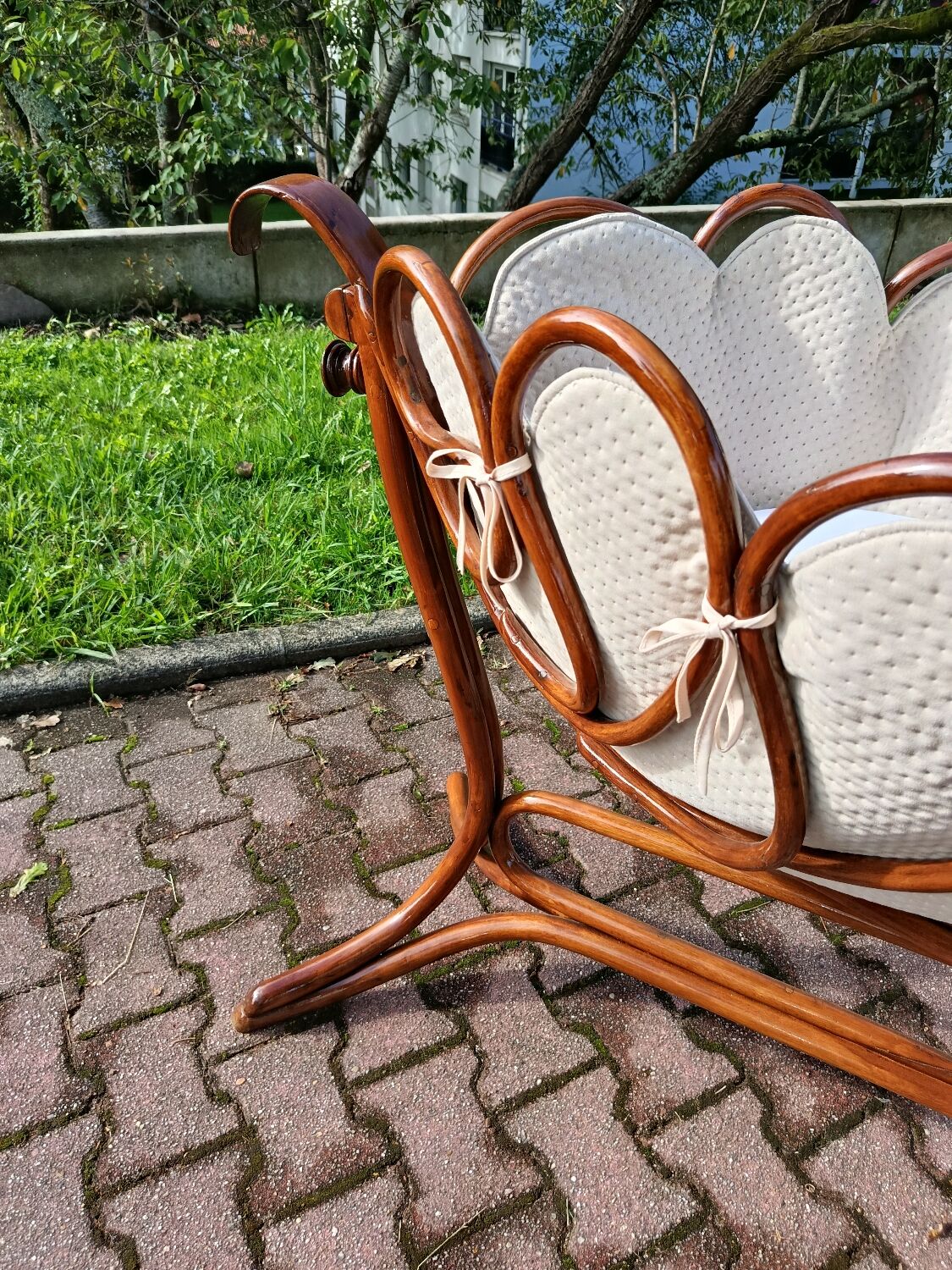 Antique cradle by J&J Khon