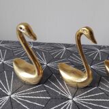Brass swans