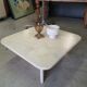 Table basse en travertin Roche bobois