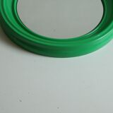 Space age round green molded plastic mirror, 1970s.