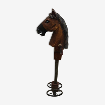 Wooden horse on stick