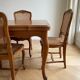 Dining table set with 6 chairs in cherry wood.