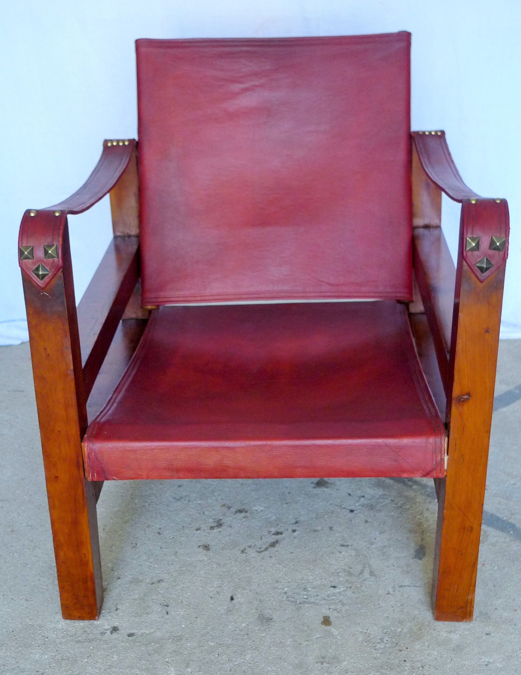 Leather and wood relaxed armchair