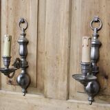 Pair of pewter-colored bronze wall sconces