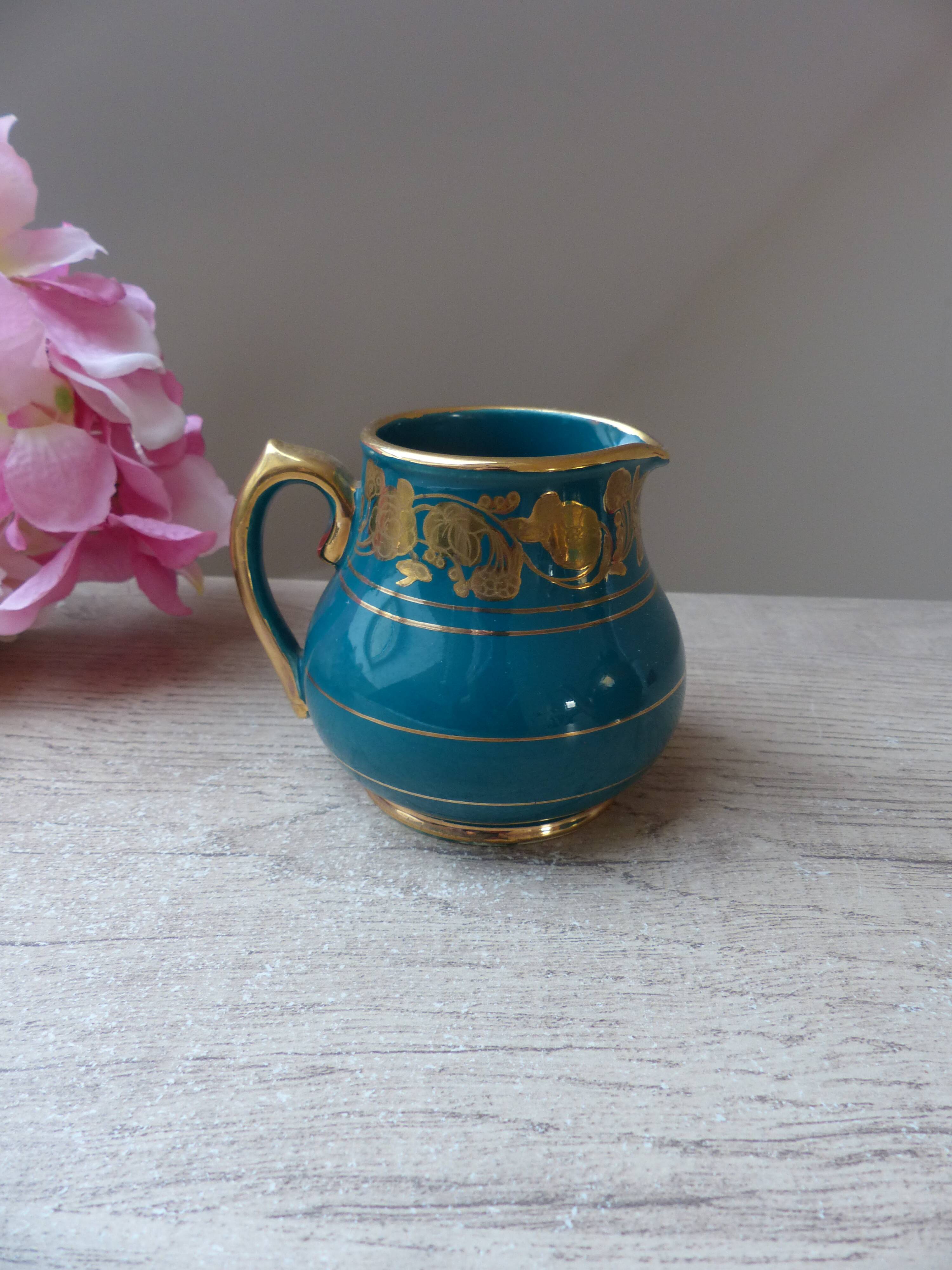 Old small Sadler cream pot in blue green ceramic with gold pattern, English creamer milk pot