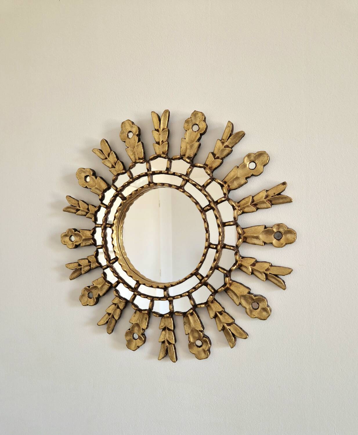 Gilded wooden sun mirror with glazing beads
