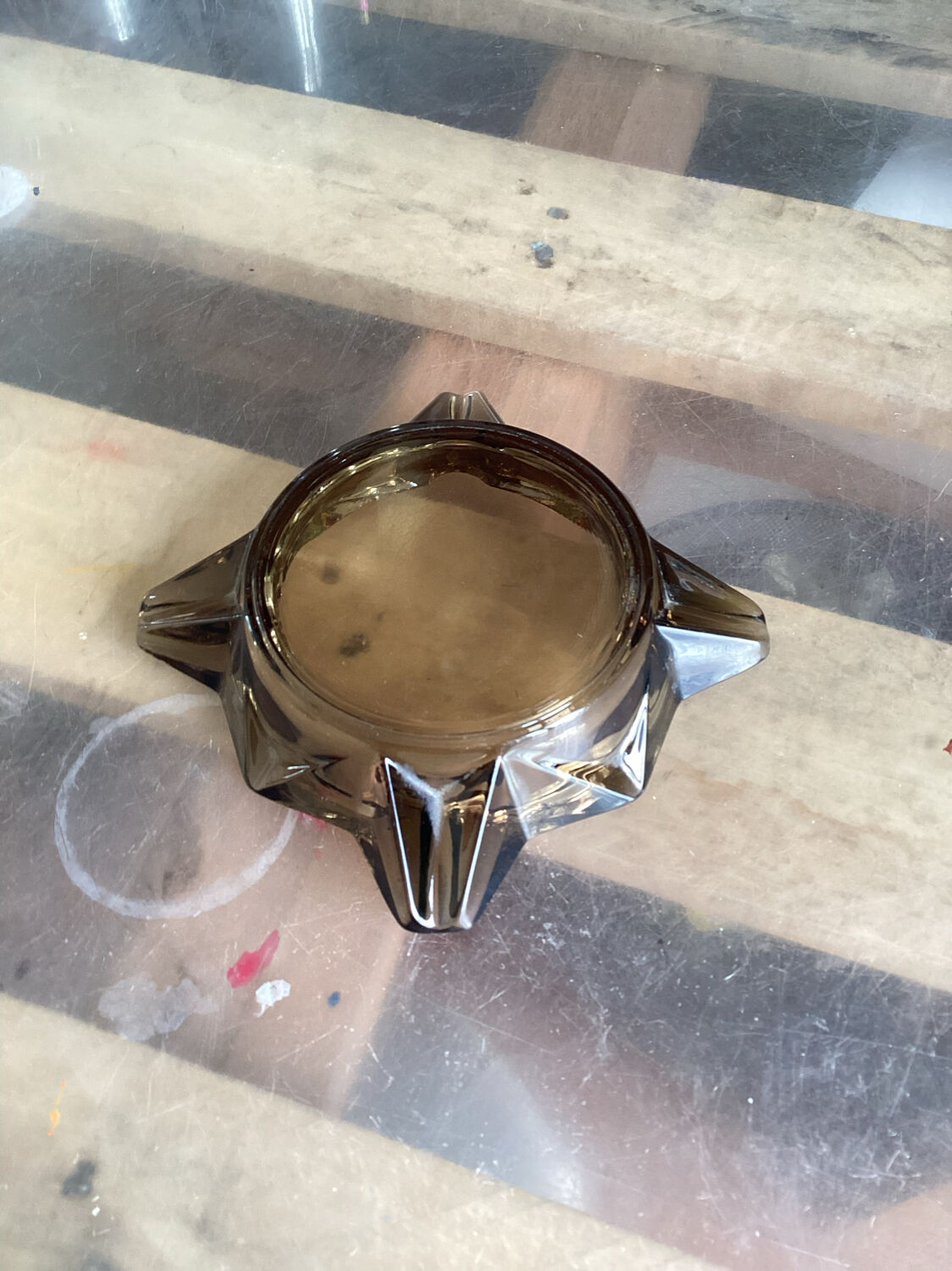 Empty ashtray vintage smoked glass pocket