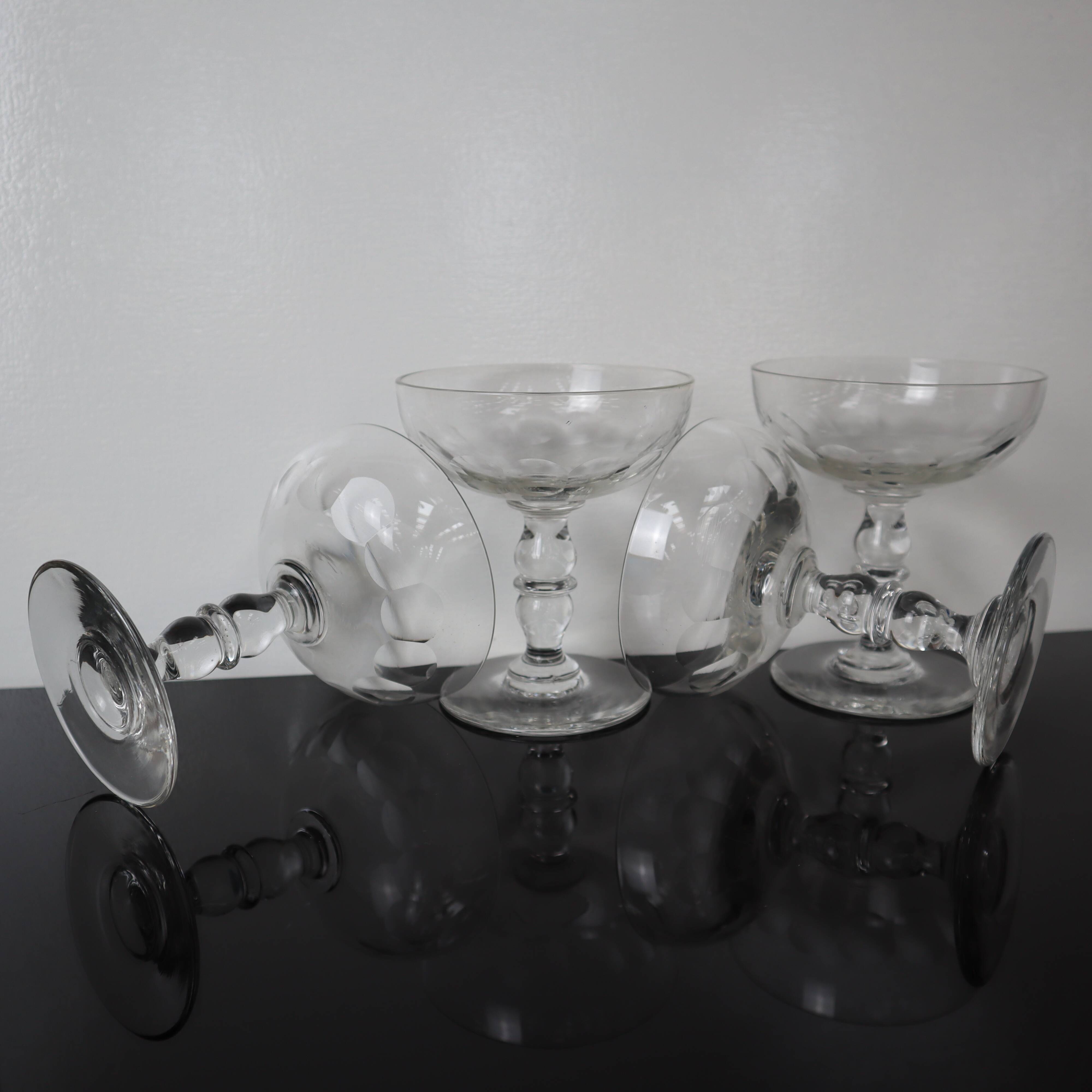 4 superb 20th century blown glass champagne glasses